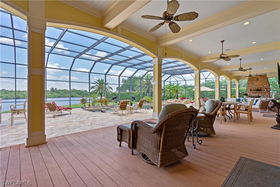 1980 Fort Denaud Road Fort Denaud, FL 33935 - Photo 24 of 35 a living room with patio furniture and a floor to ceiling window