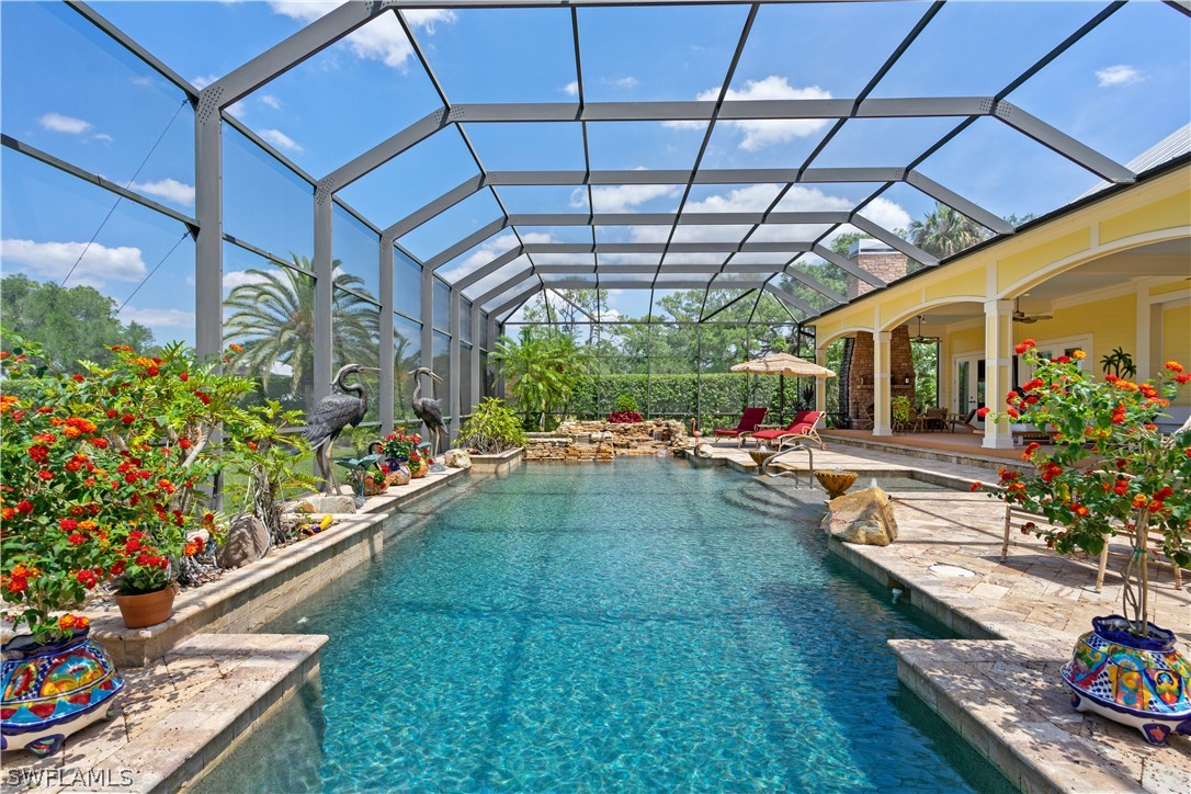 1980 Fort Denaud Road Fort Denaud, FL 33935 - Photo 26 of 35 a view of a porch and a yard