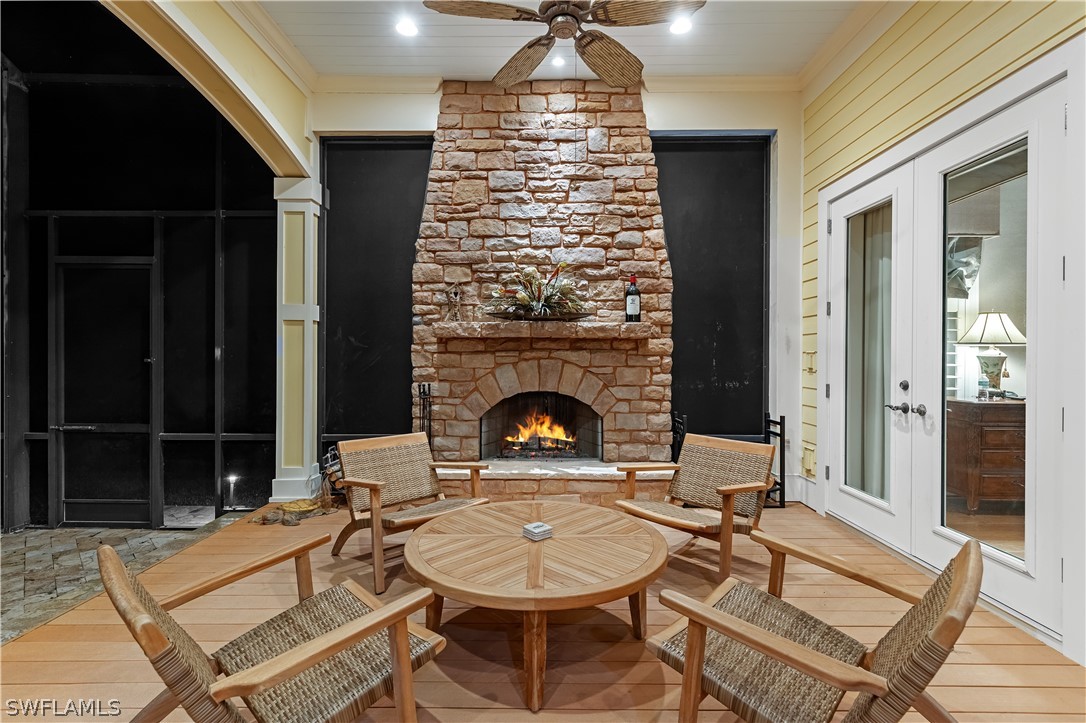 1980 Fort Denaud Road Fort Denaud, FL 33935 - Photo 30 of 35 a living room with furniture a table and a fireplace