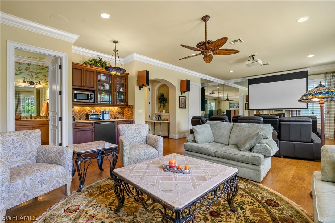 1980 Fort Denaud Road Fort Denaud, FL 33935 - Photo 32 of 35 a living room with furniture and kitchen view
