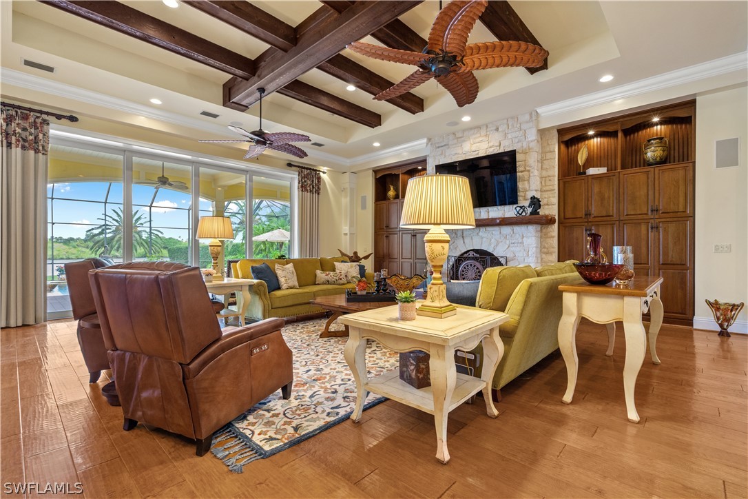 1980 Fort Denaud Road Fort Denaud, FL 33935 - Photo 7 of 35 a living room with furniture and a chandelier