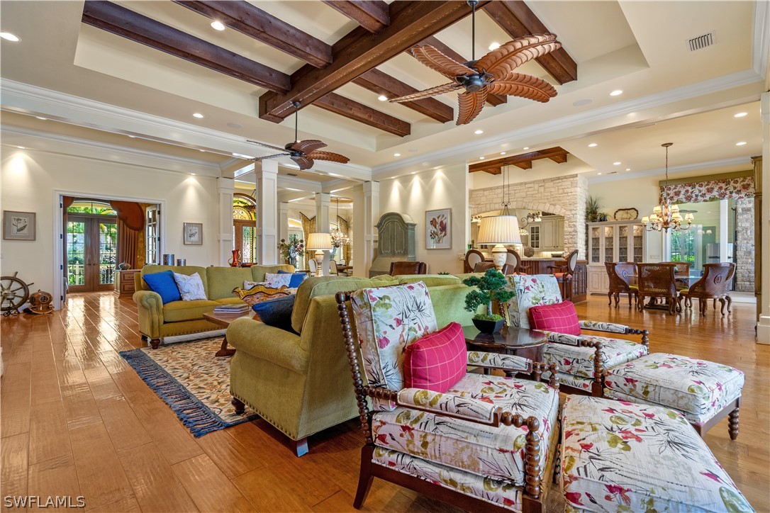 1980 Fort Denaud Road Fort Denaud, FL 33935 - Photo 8 of 35 a living room with lots of furniture and wooden floors