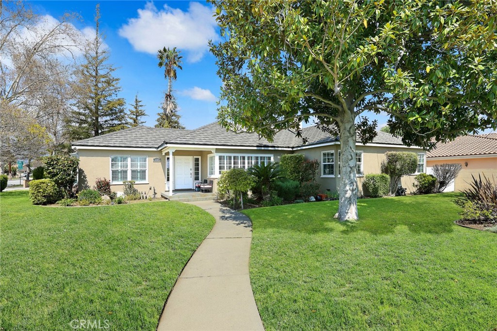 385 Walnut Avenue Arcadia, CA 91007 - Photo 1 of 7 a front view of a house with garden