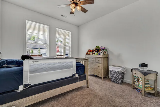 a view of a hallway with a livingroom