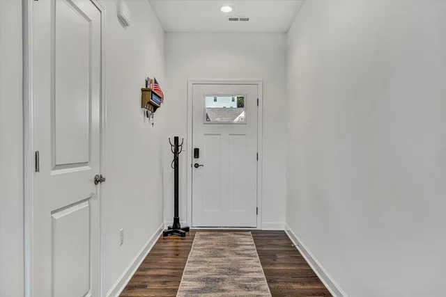 a view of a hallway with closet