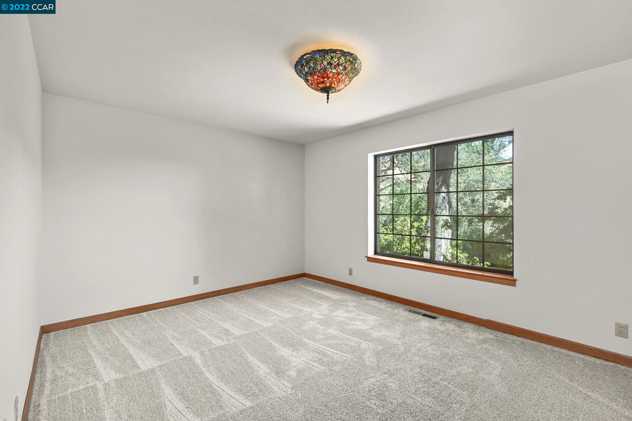 5433 Alhambra Valley Road Martinez, CA 94553 - Photo 27 of 59 an empty room with a window