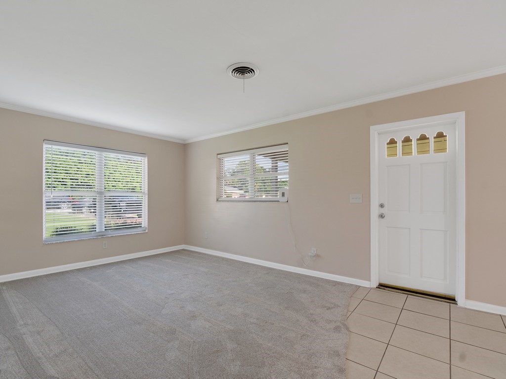 4606 30th Avenue Vero Beach, FL 32967 - Photo 13 of 33 a view of an empty room with a window