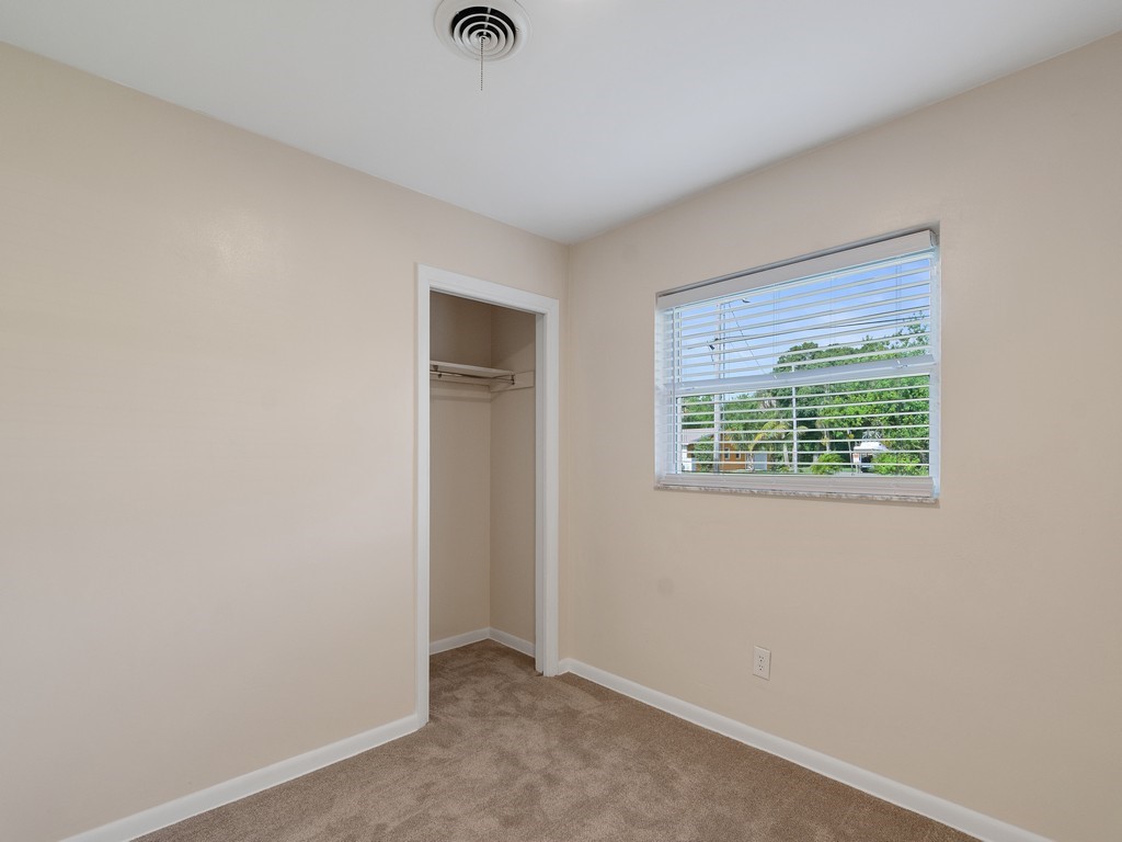 4606 30th Avenue Vero Beach, FL 32967 - Photo 21 of 33 an empty room with windows