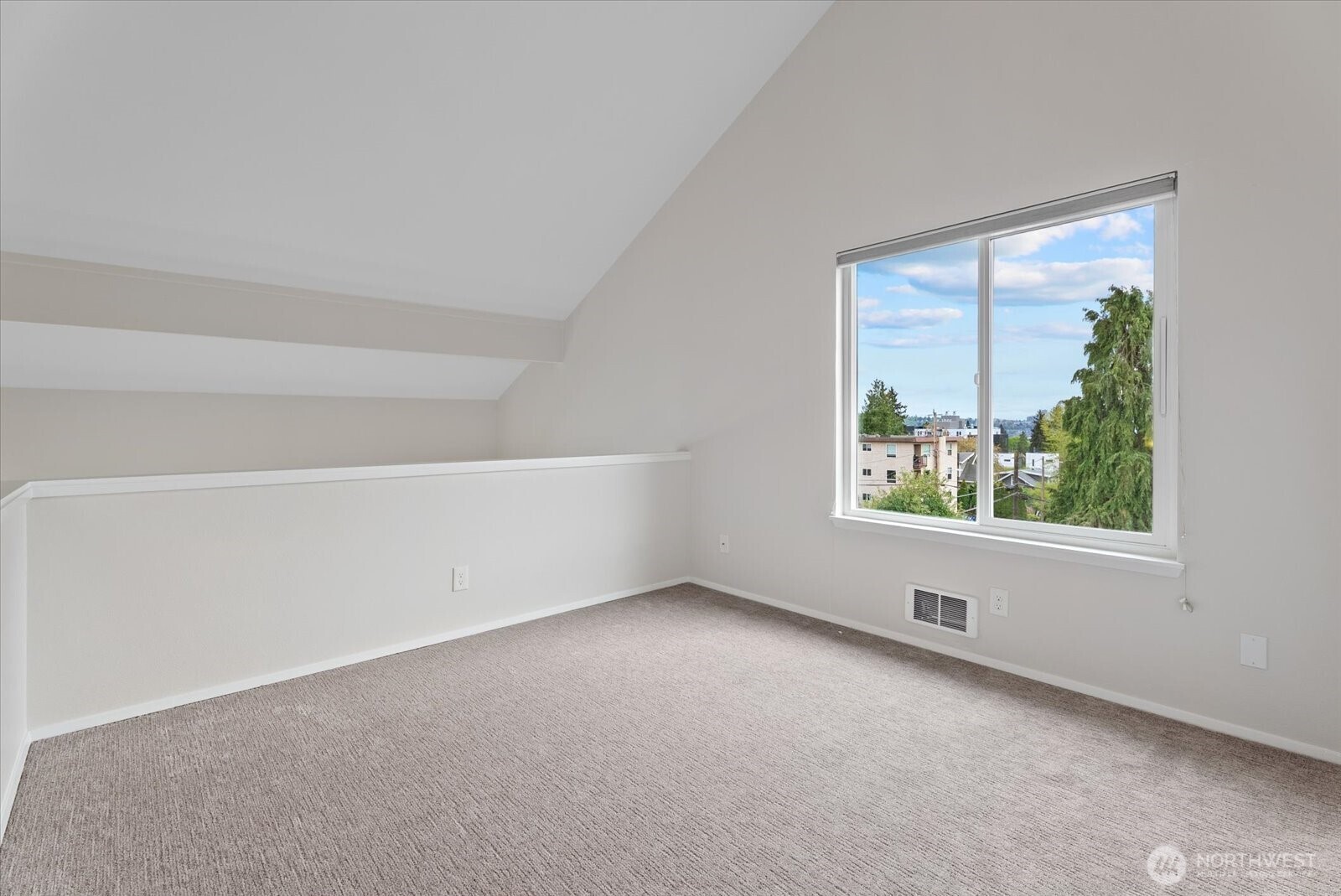 1109 North Allen Place, Unit 205 Seattle, WA 98103 - Photo 14 of 26 an empty room with windows
