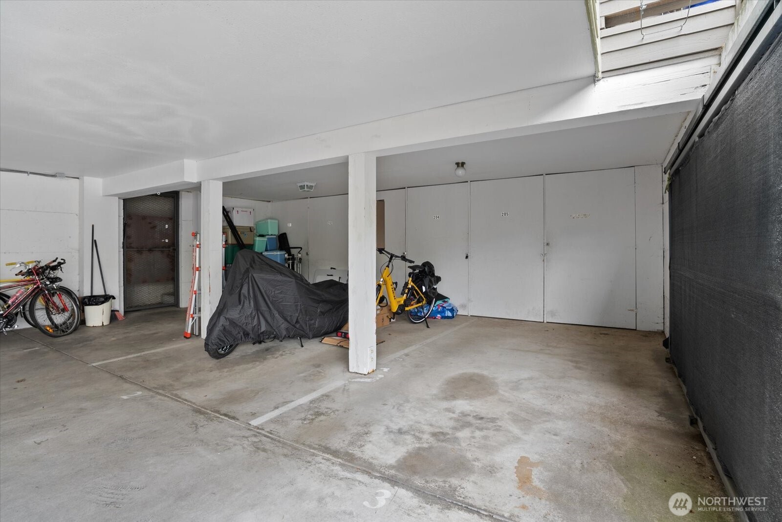 1109 North Allen Place, Unit 205 Seattle, WA 98103 - Photo 20 of 26 a view of a room with gym equipment