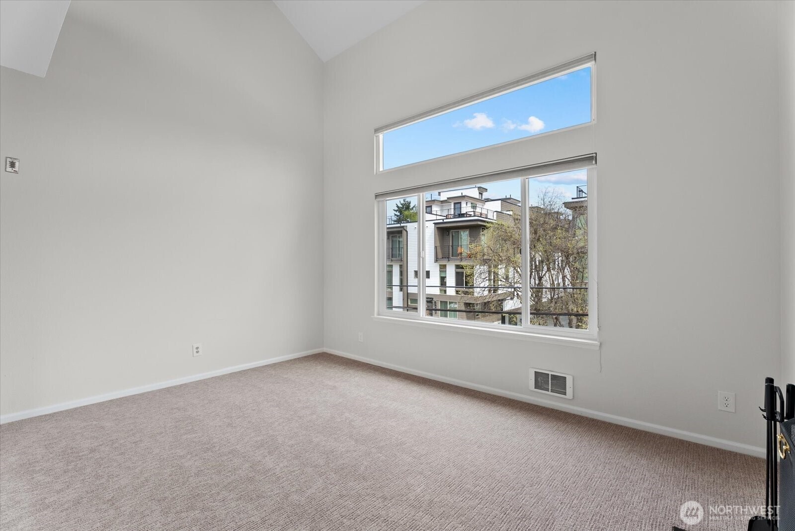 1109 North Allen Place, Unit 205 Seattle, WA 98103 - Photo 10 of 26 a view of an empty room with a window