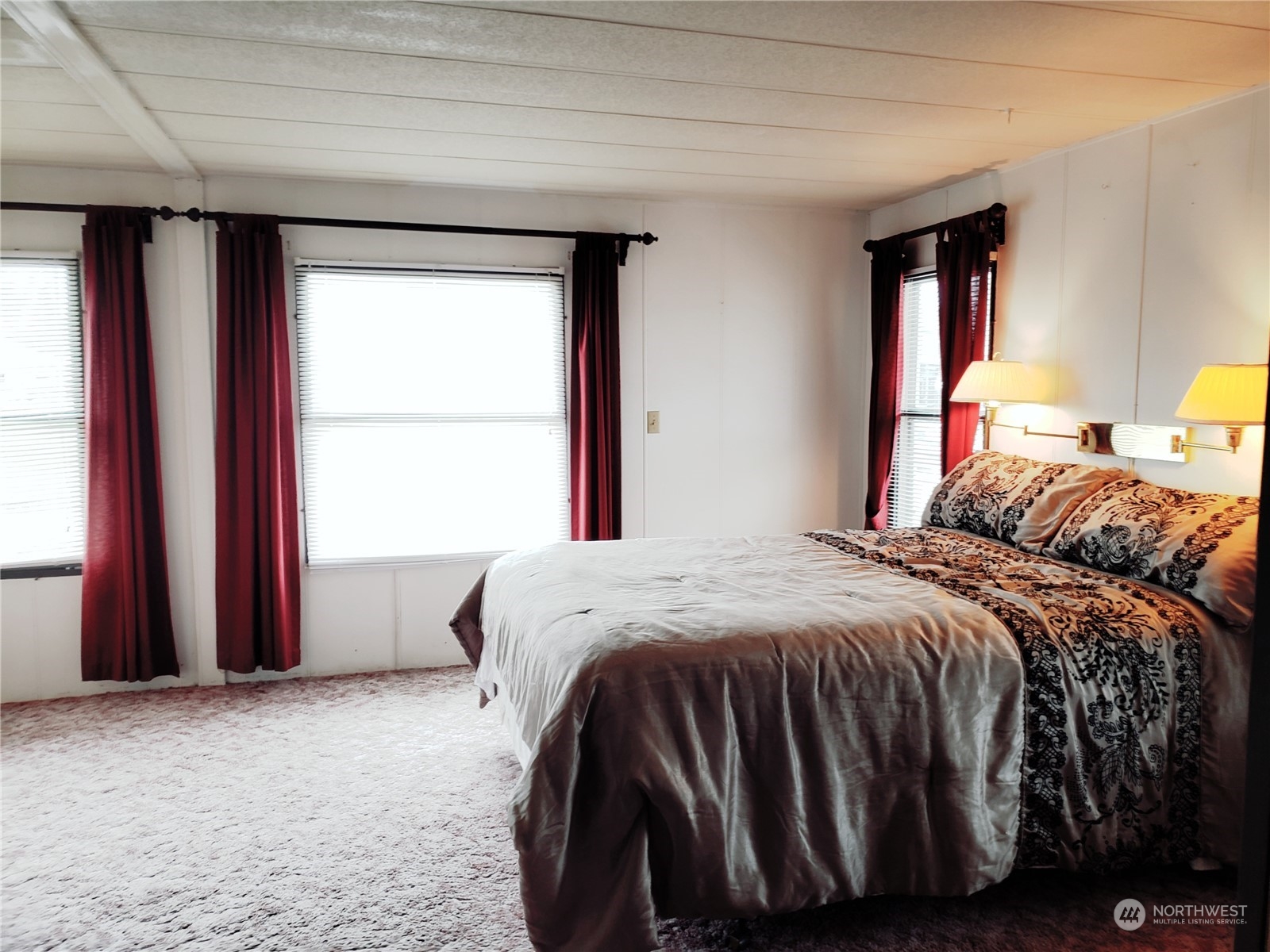 1080 Pine Drive Enumclaw, WA 98022 - Photo 19 of 36 a bedroom with a bed and window