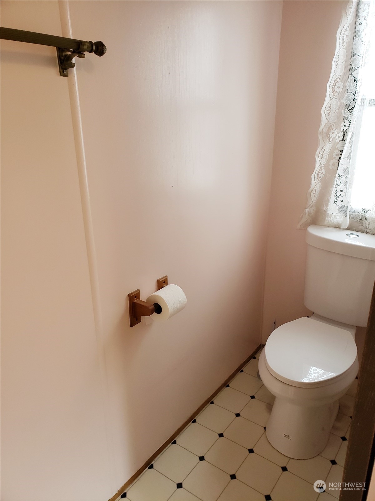 1080 Pine Drive Enumclaw, WA 98022 - Photo 24 of 36 a white toilet sitting next to a shower