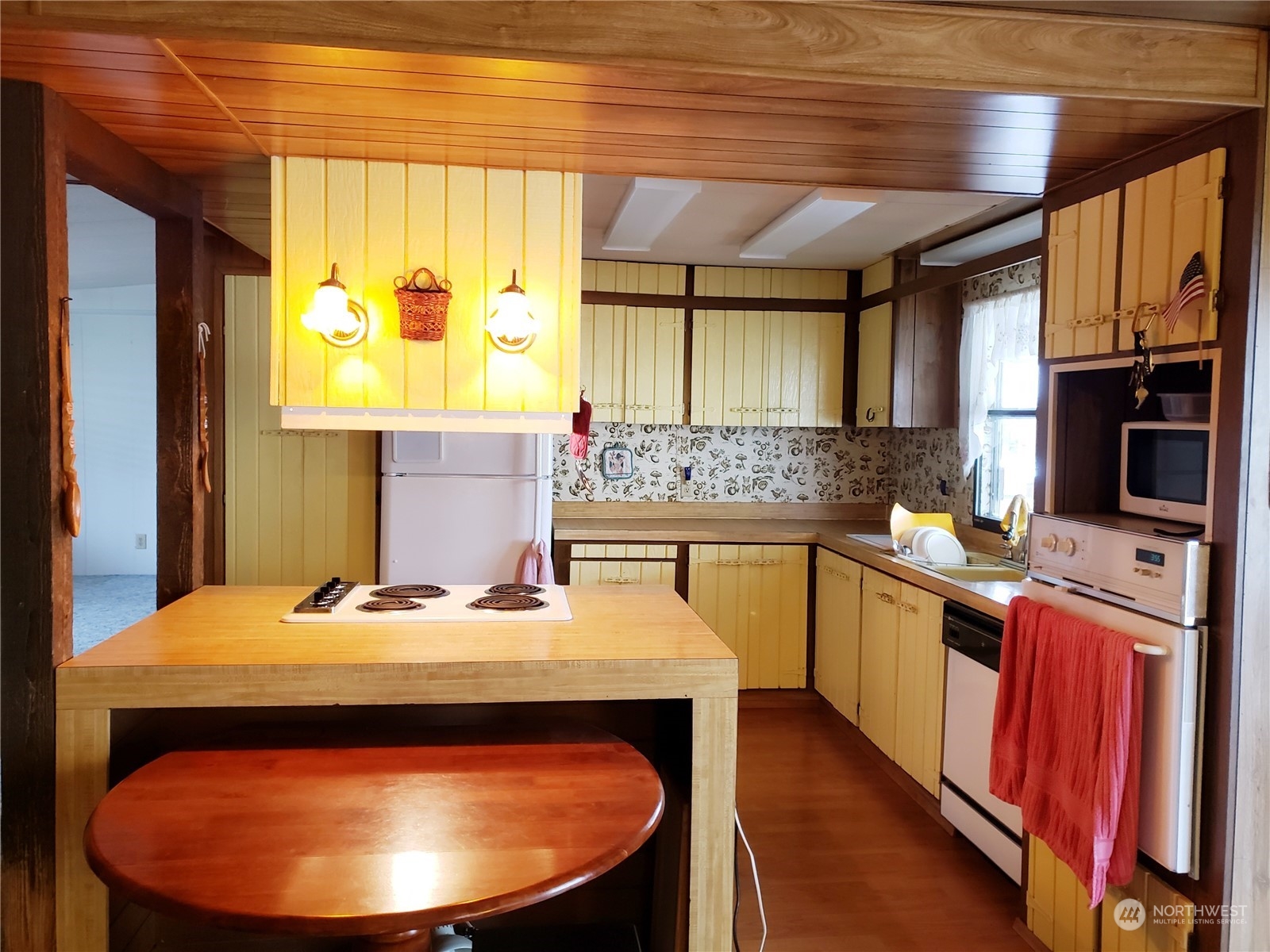 1080 Pine Drive Enumclaw, WA 98022 - Photo 5 of 36 a kitchen with a sink appliances and a window