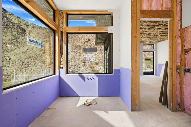 an empty room with sliding door