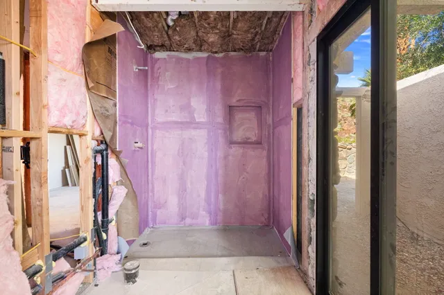 a view of a house with a iron gate