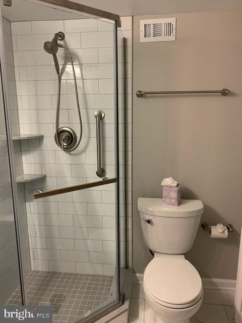 3452 South Utah Street, Unit A Arlington, VA 22206 - Photo 11 of 15 a bathroom with a toilet and a shower