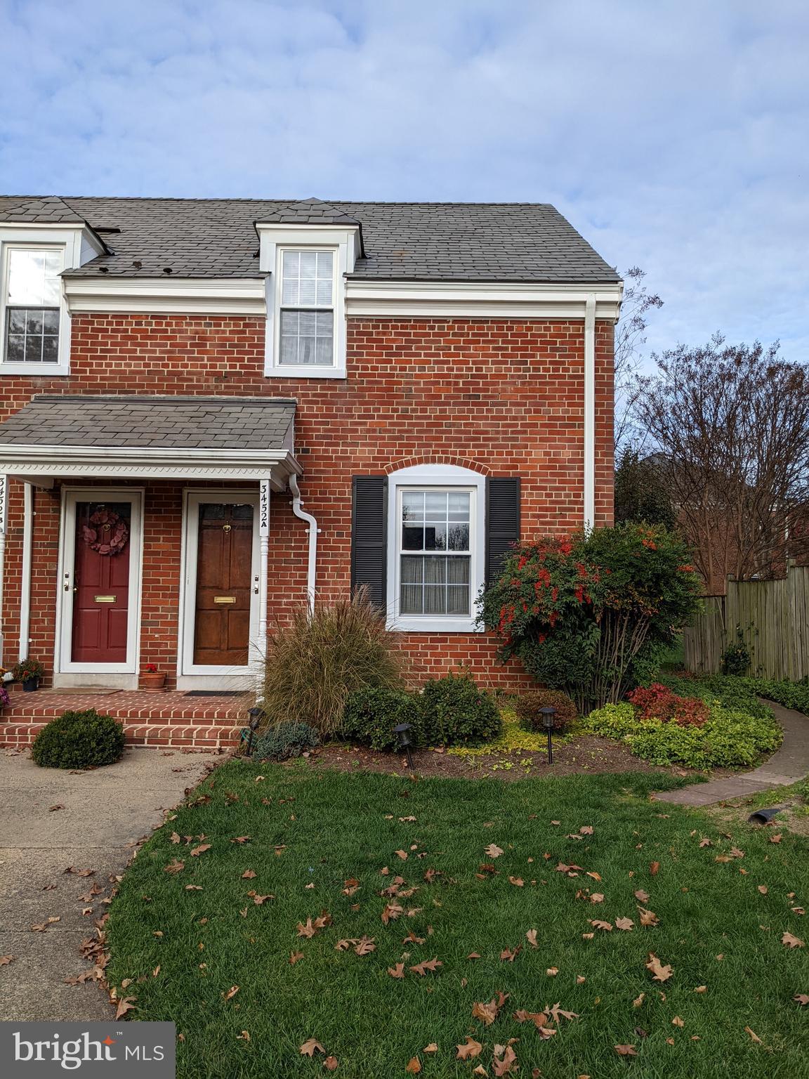 3452 South Utah Street, Unit A Arlington, VA 22206 - Photo 2 of 15 front view of a house with a yard