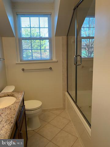 3452 South Utah Street, Unit A Arlington, VA 22206 - Photo 9 of 15 a bathroom with a granite countertop sink toilet and shower