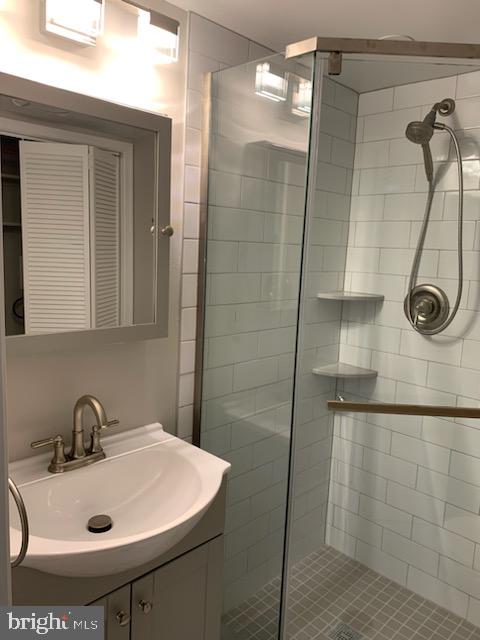 3452 South Utah Street, Unit A Arlington, VA 22206 - Photo 10 of 15 a bathroom with a sink and shower