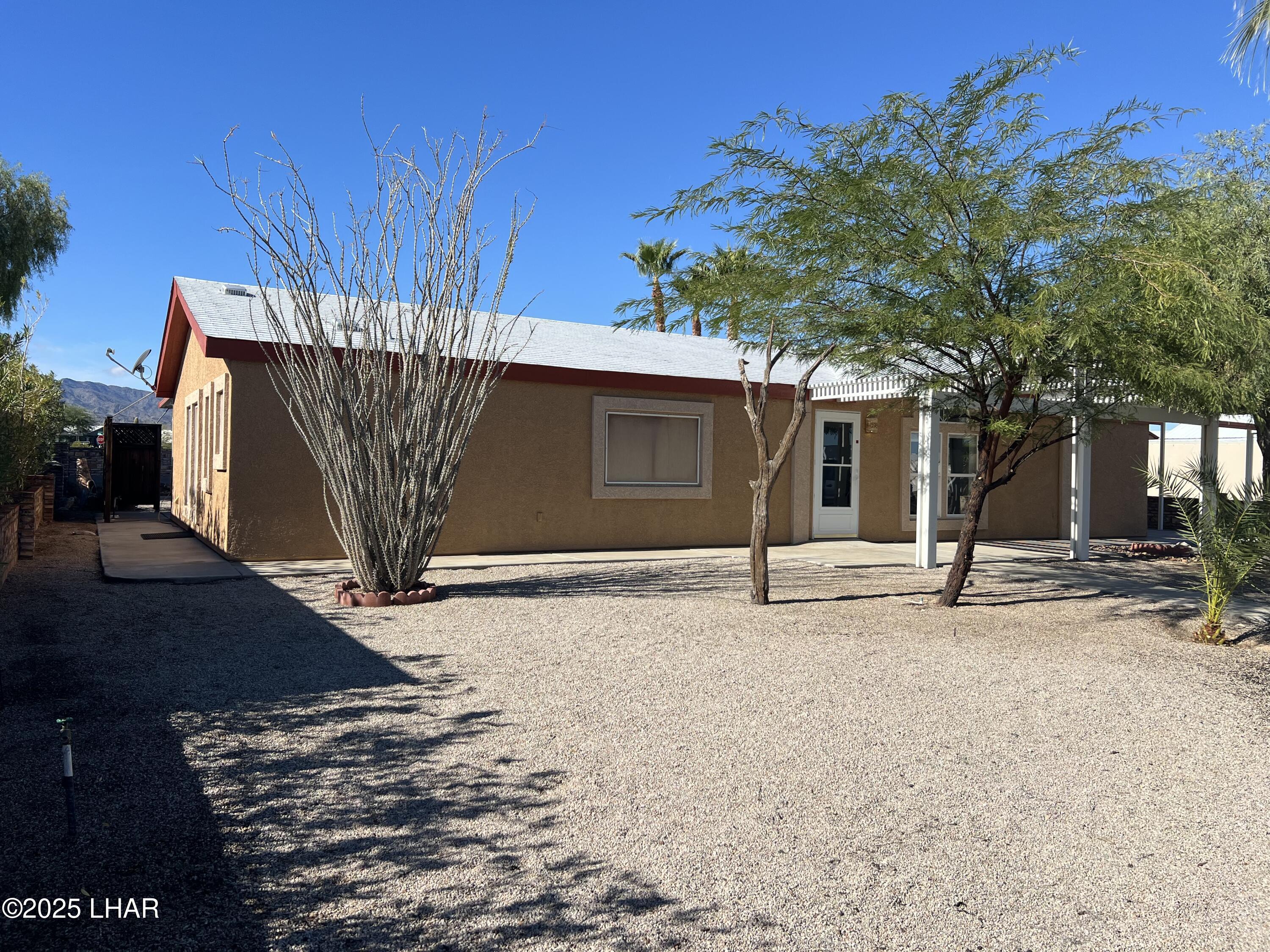 49688 Ruby Avenue Quartzsite, AZ 85346 - Photo 2 of 33 Ocotillo and Mesquite compliment the front yard