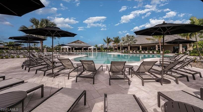 15765 Cortina Street Naples, FL 34114 - Photo 47 of 50 an outdoor space with patio having patio