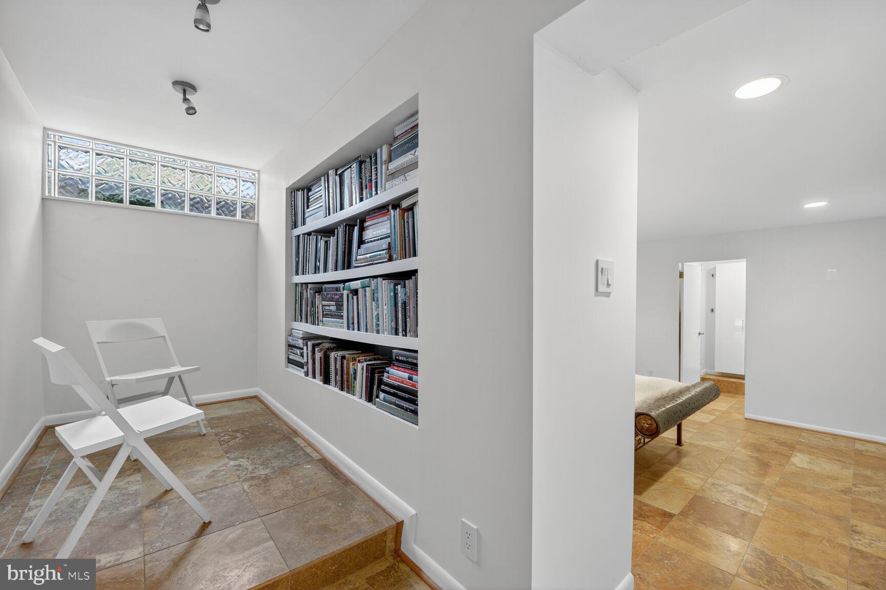 4100 Cathedral Avenue Northwest, Unit 615 Washington, DC 20016 - Photo 15 of 26 a view of a workspace with furniture