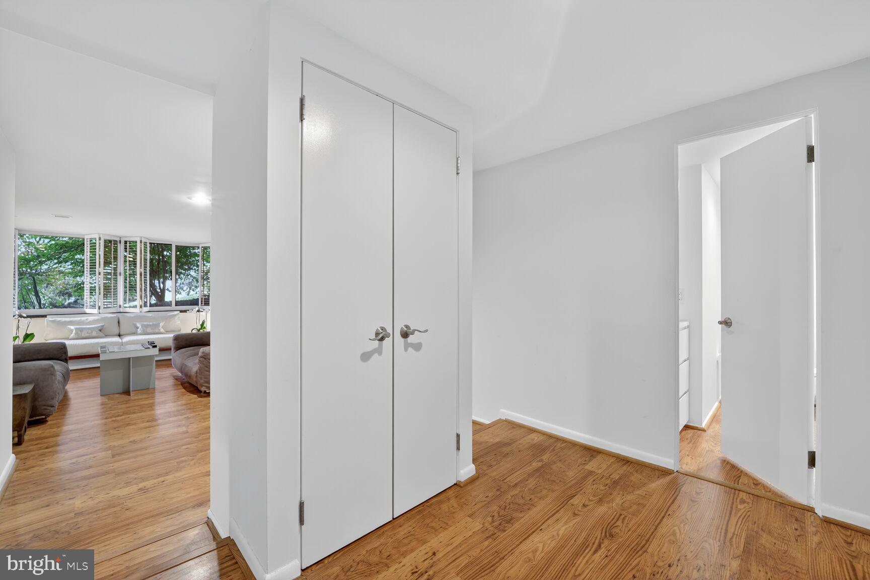 4100 Cathedral Avenue Northwest, Unit 615 Washington, DC 20016 - Photo 17 of 26 a view of a living room and hardwood floor