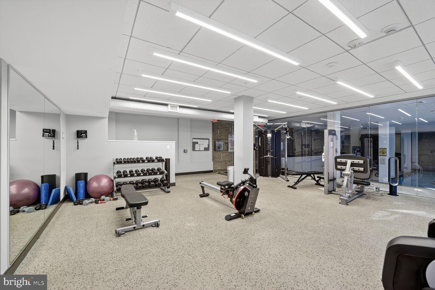4100 Cathedral Avenue Northwest, Unit 615 Washington, DC 20016 - Photo 21 of 26 a view of a room with gym equipment