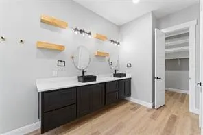 a view with a sink and a mirror