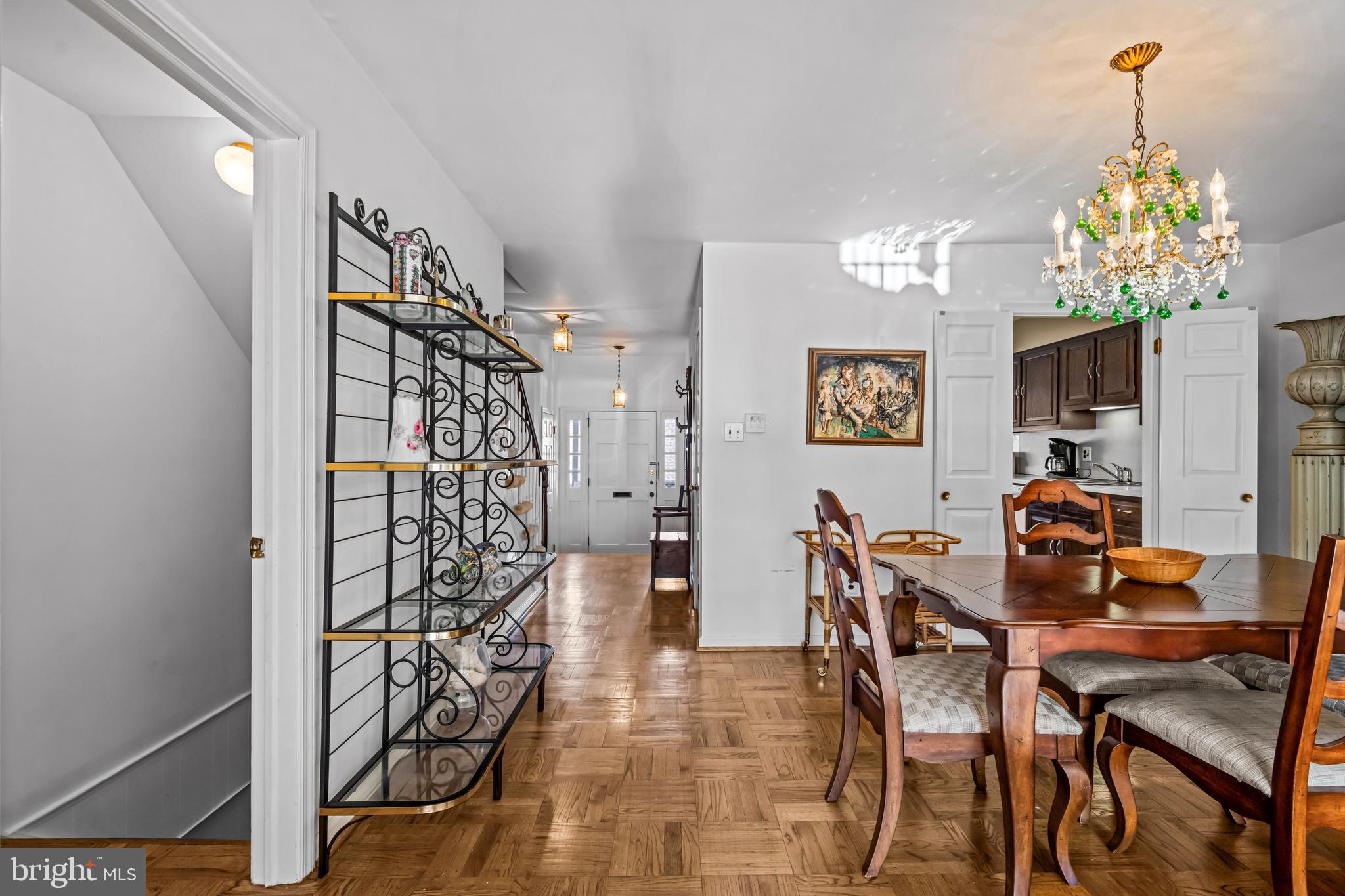 633 East Main Street, Unit B7 Moorestown, NJ 08057 - Photo 15 of 42 a view of a dining room with furniture and chandelier