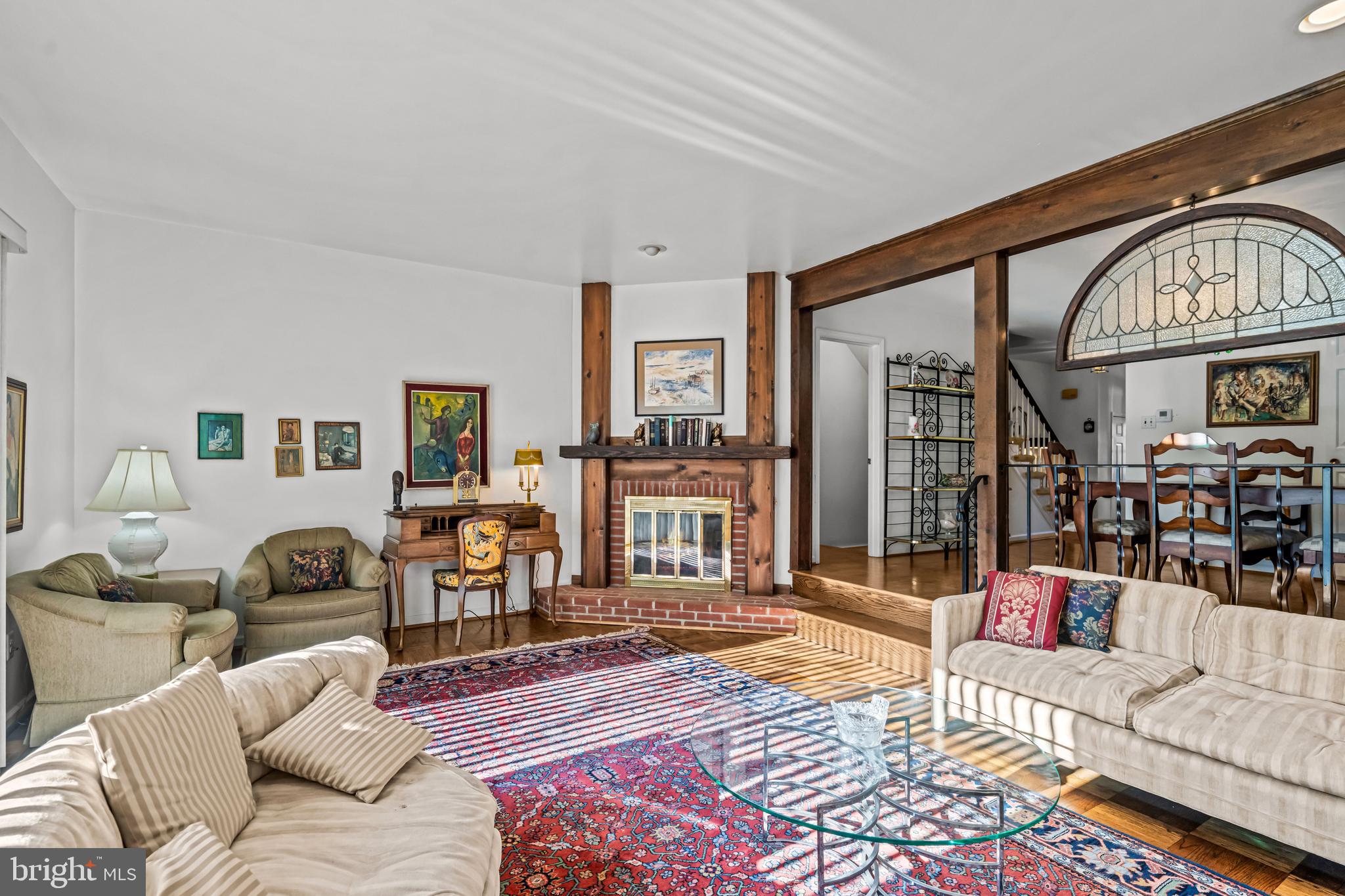 633 East Main Street, Unit B7 Moorestown, NJ 08057 - Photo 18 of 42 a living room with furniture a fireplace and a table