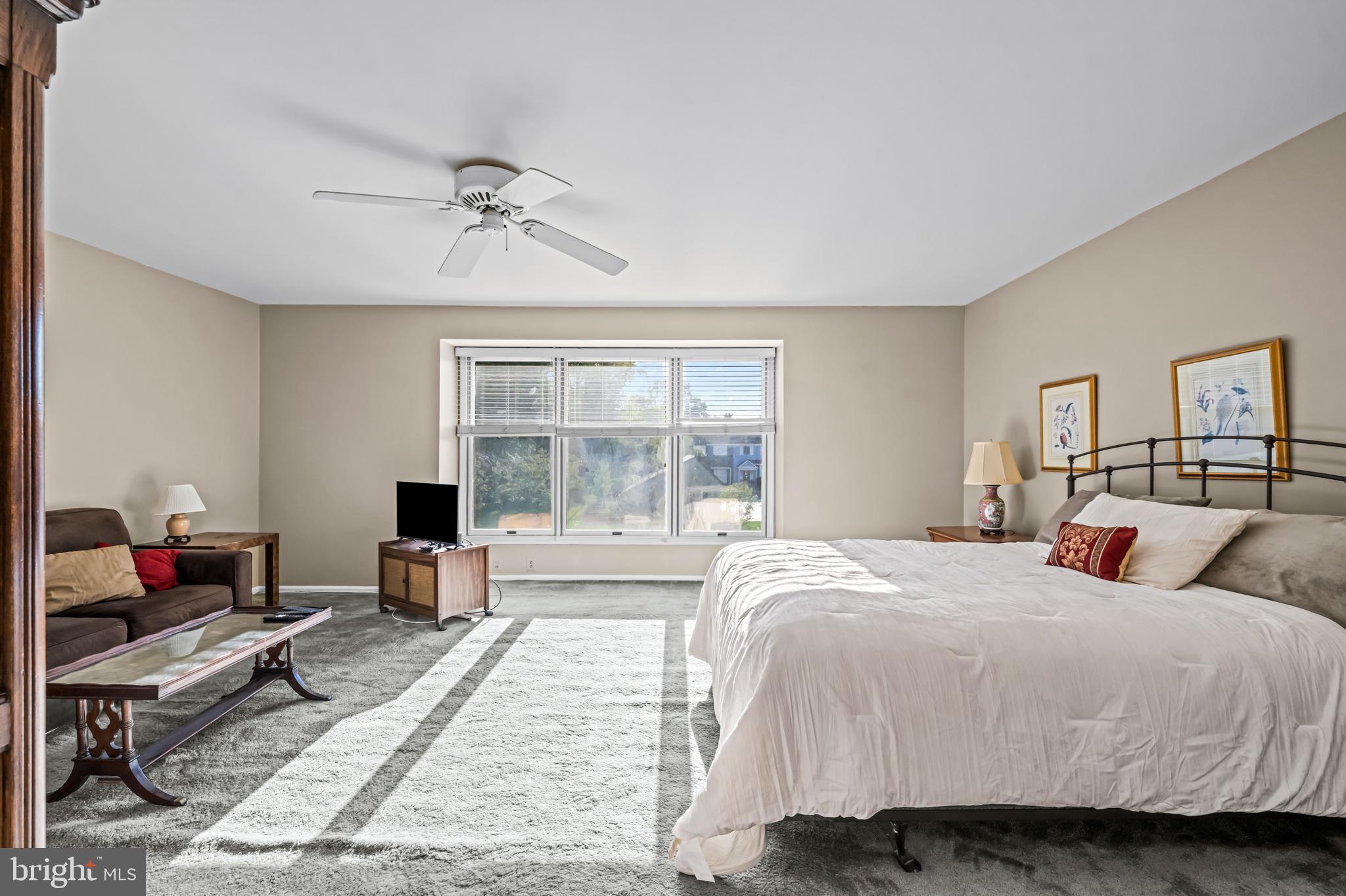 633 East Main Street, Unit B7 Moorestown, NJ 08057 - Photo 25 of 42 a bedroom with a bed and a desk