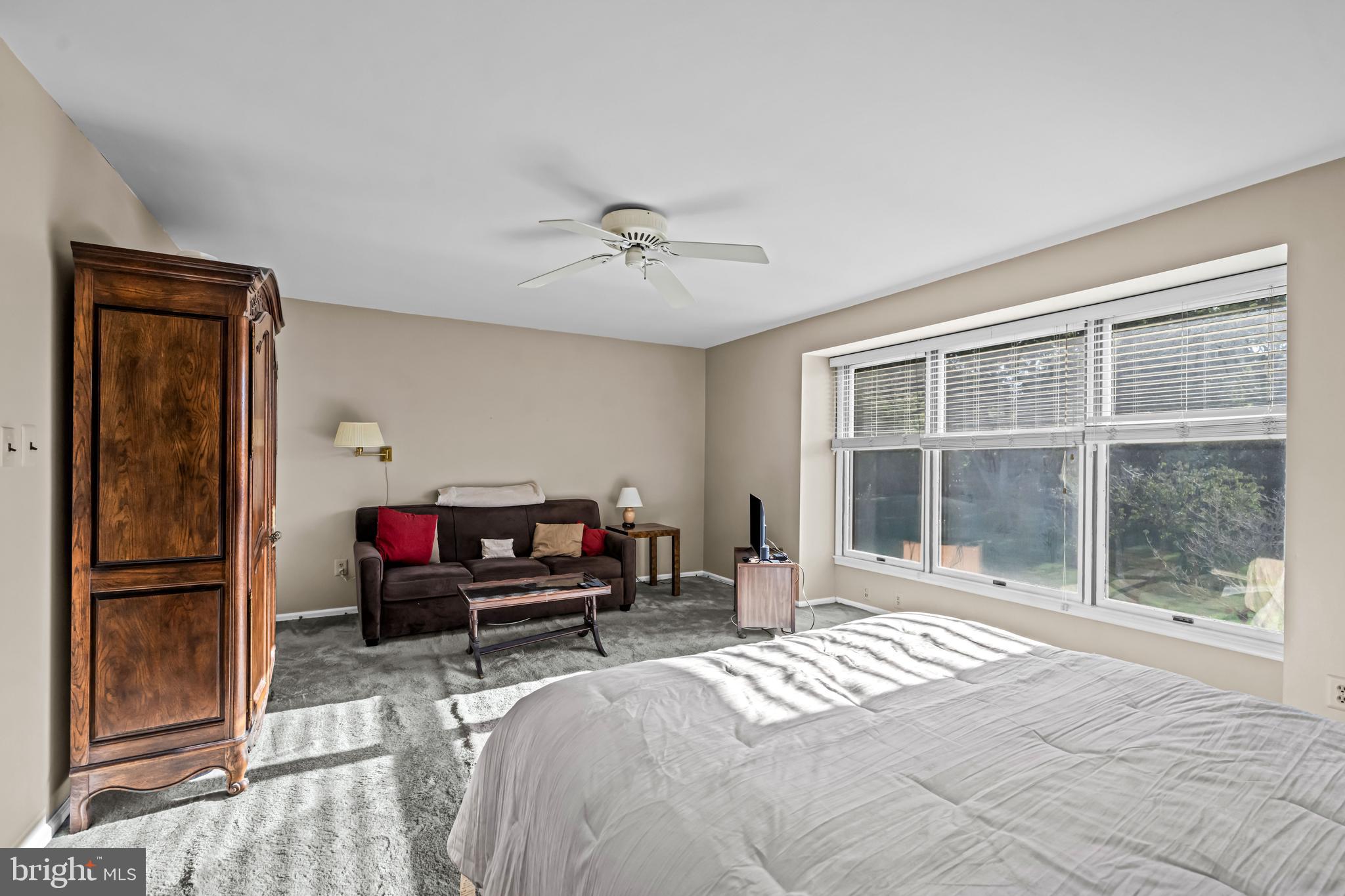 633 East Main Street, Unit B7 Moorestown, NJ 08057 - Photo 27 of 42 a bedroom with a bed and a window