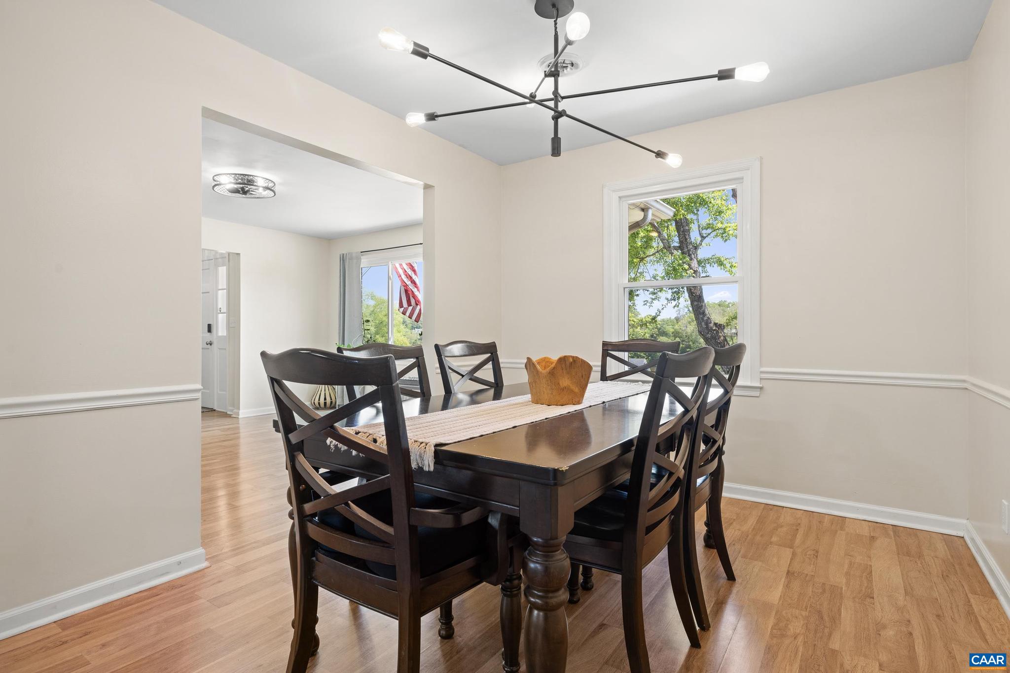 752 Westwood Road Stanardsville, VA 22973 - Photo 12 of 63 a view of a dining room with furniture and wooden floor
