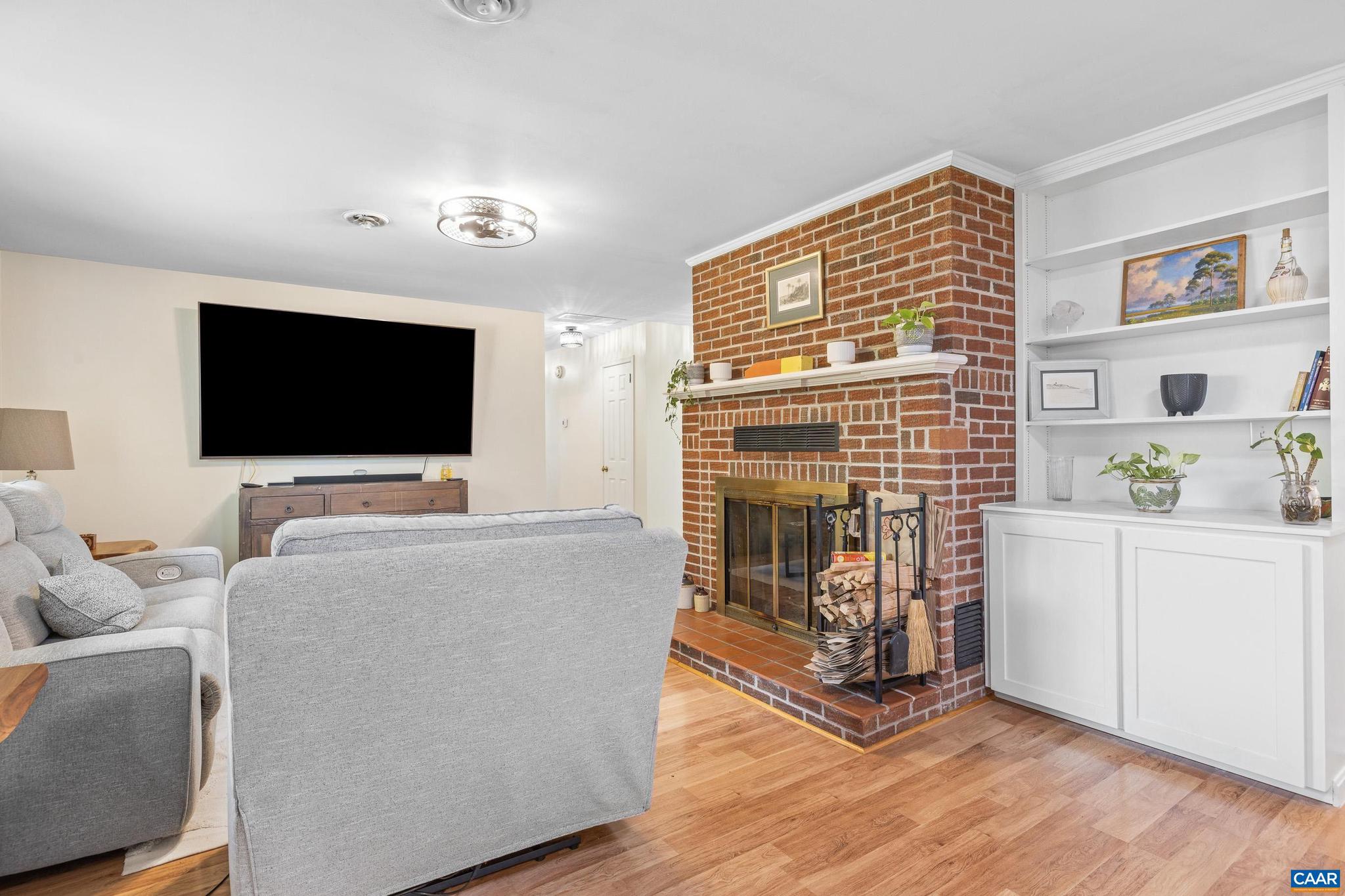 752 Westwood Road Stanardsville, VA 22973 - Photo 22 of 63 a living room with furniture and a flat screen tv