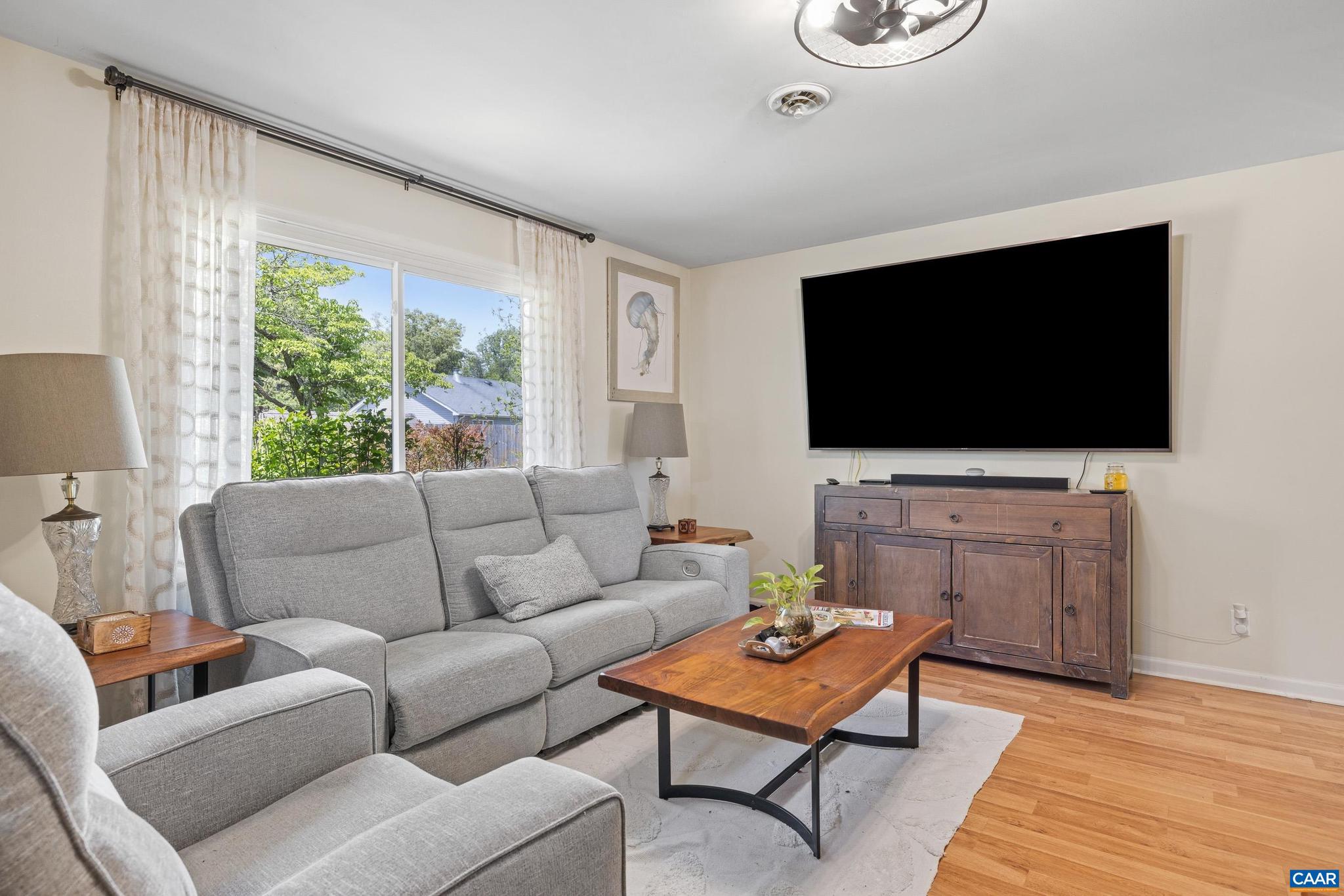 752 Westwood Road Stanardsville, VA 22973 - Photo 24 of 63 a living room with furniture and a flat screen tv