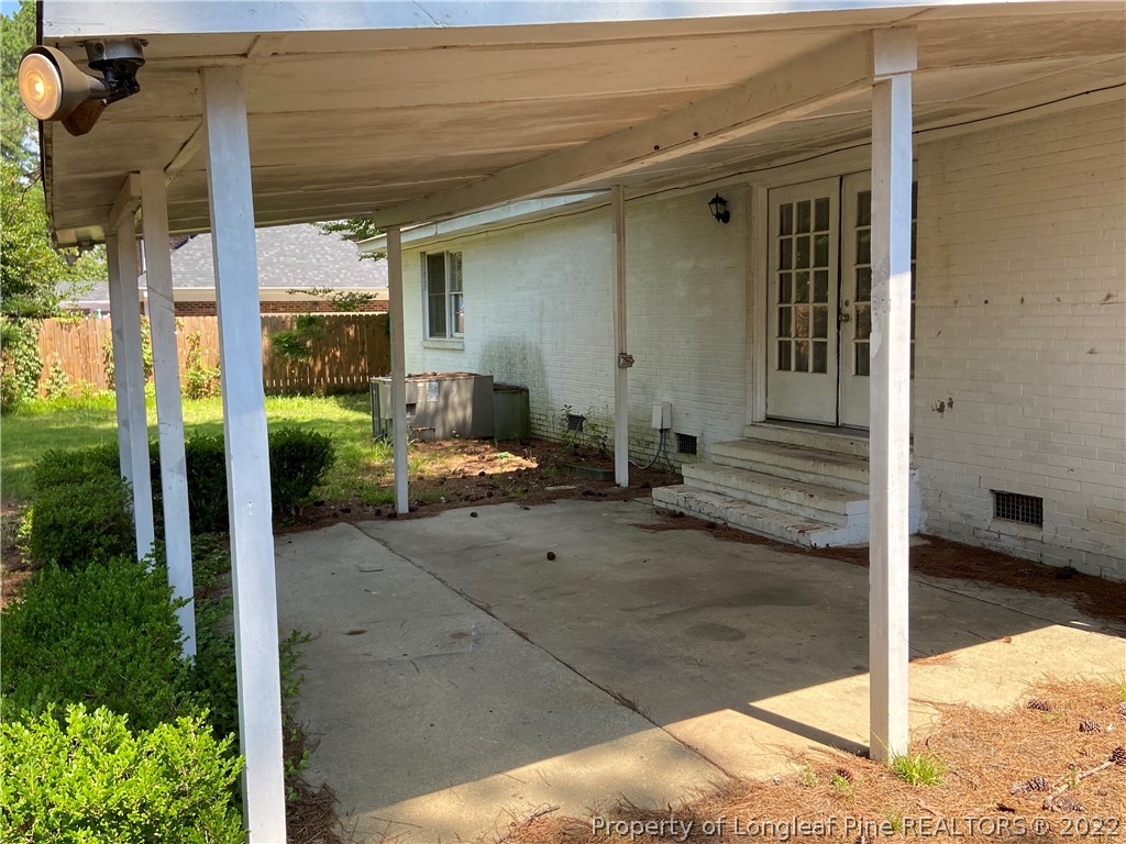 215 Rivenoak Drive Fayetteville, NC 28303 - Photo 20 of 21 a view of a porch with backyard