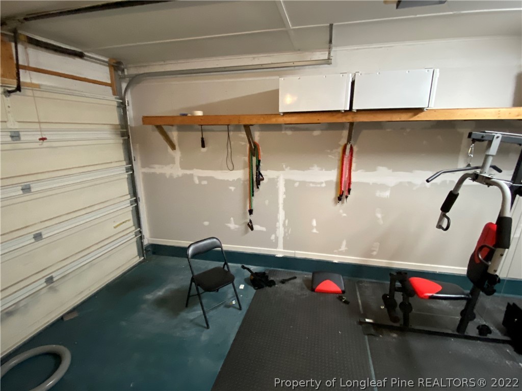 215 Rivenoak Drive Fayetteville, NC 28303 - Photo 21 of 21 a room with storage and utility