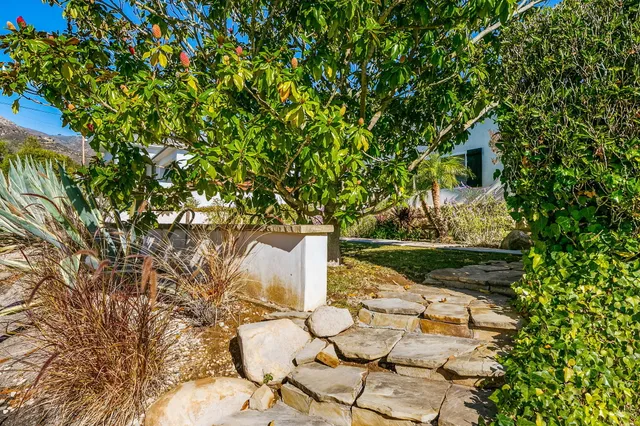 a view of yard from outdoor seating