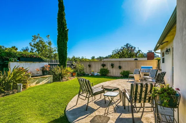 a view of a swimming pool with a lake view