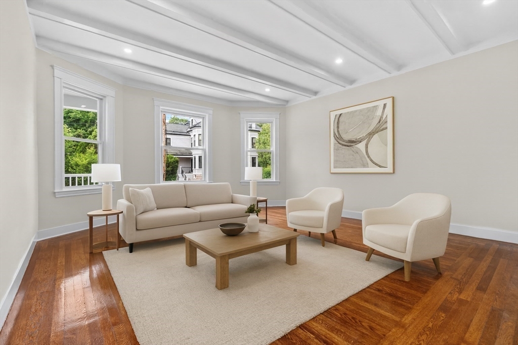 31 George Street, Unit 31 Newton, MA 02458 - Photo 6 of 10 a living room with furniture and a rug
