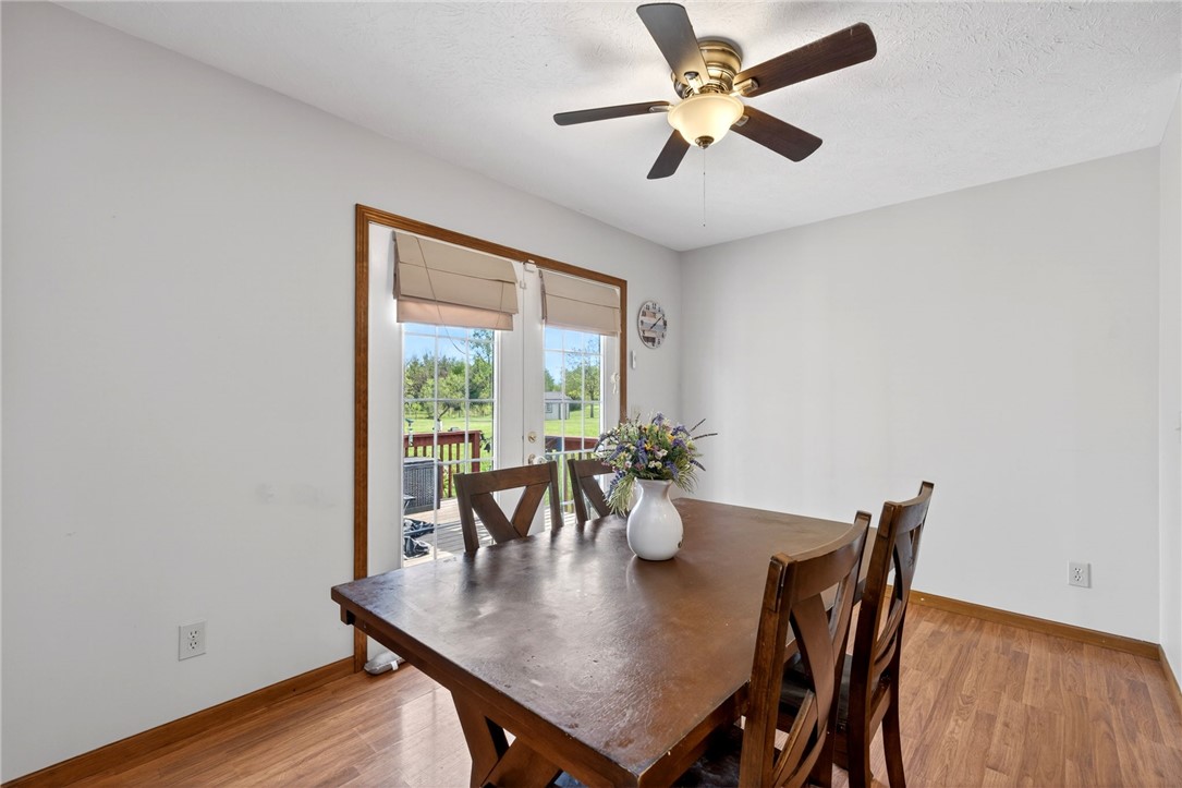 4996 Shannon Avenue Springfield, OH 45504 - Photo 25 of 61 This bright dining area features direct access to outdoor living through glass doors.