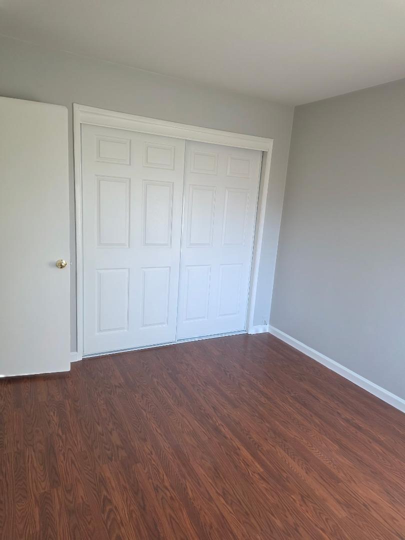 5745 Almaden Road, Unit D San Jose, CA 95118 - Photo 11 of 11 a view of an empty room with wooden floor