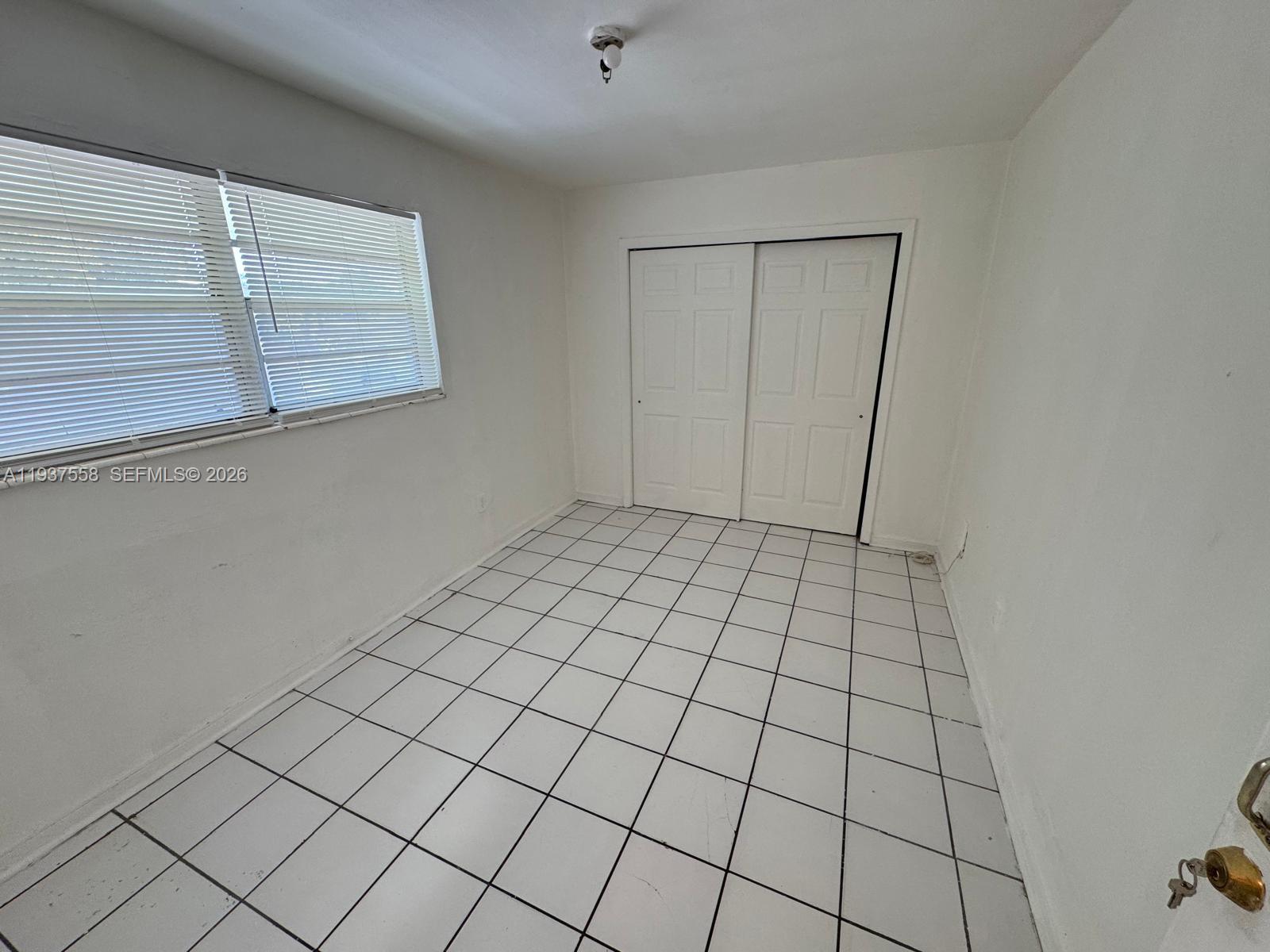 201 Northwest 77th Street, Unit 3 Miami, FL 33150 - Photo 9 of 15 a view of an empty room