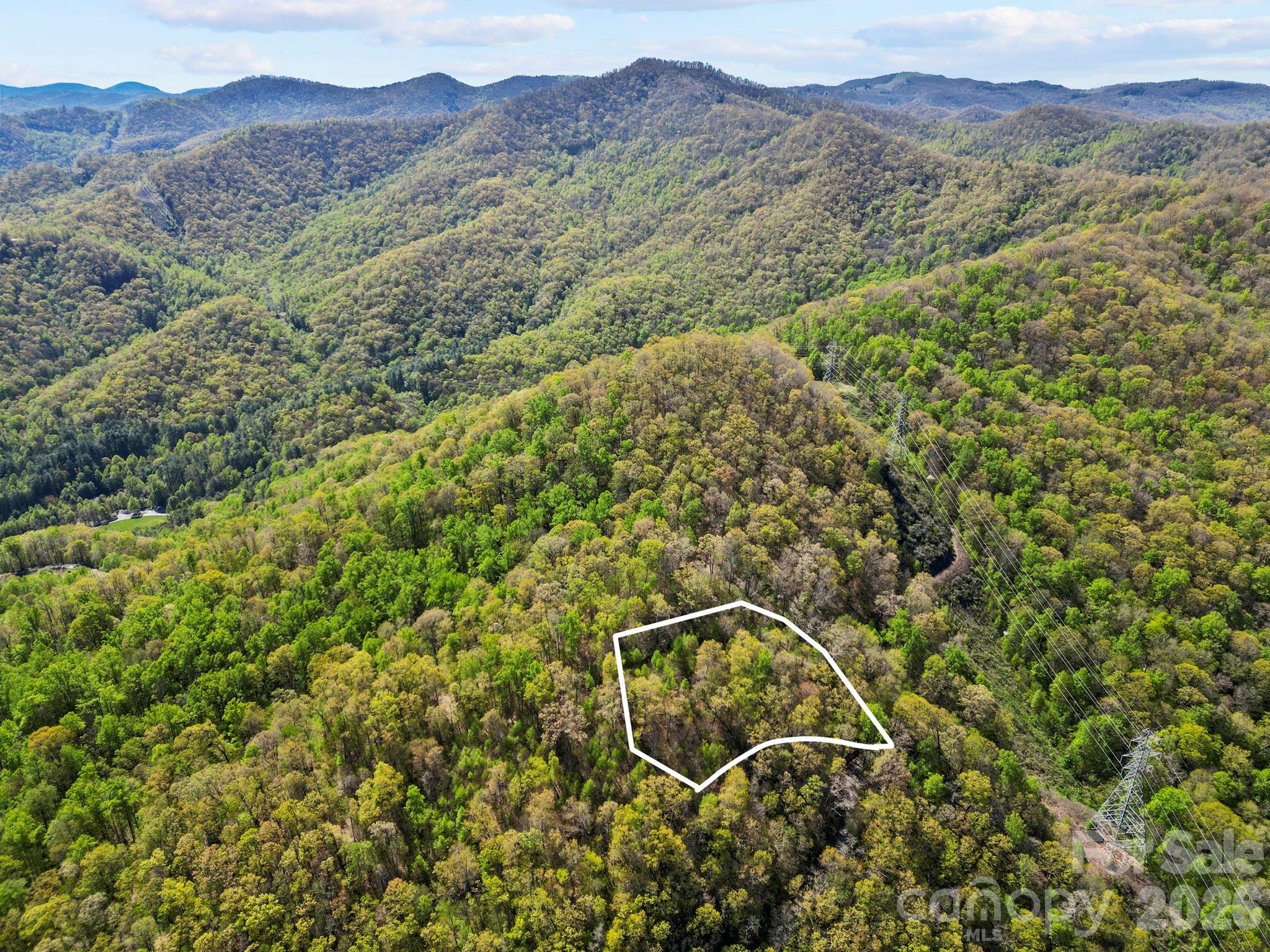 0 Oat Field Road, Unit 5B Tuckasegee, NC 28783 - Photo 2 of 17 a view of a city with a mountain