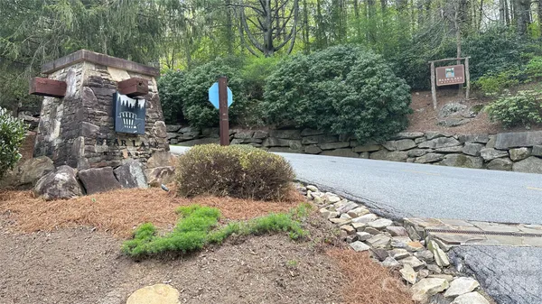 a view of a backyard of the house