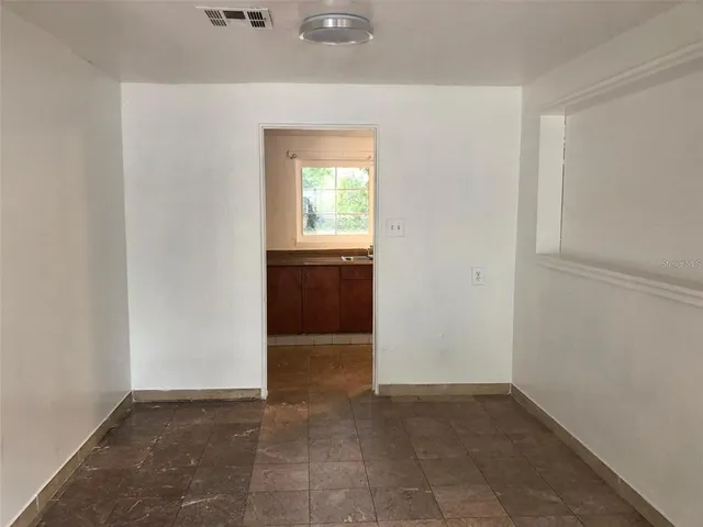 an empty room with window