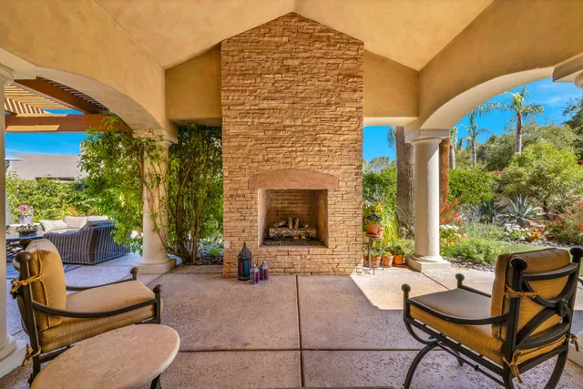 a kitchen with sink stove and refrigerator