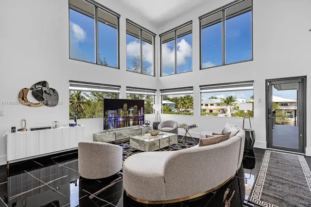 a kitchen with granite countertop a stove sink and cabinets